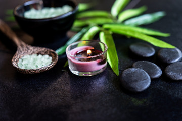 Spa cosmetic products organic green concept, spa beautiful massage on black background top view and copy space for text, Thai Spa relax and treatment for body healthy.
