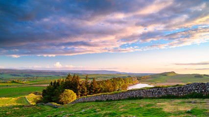 Hadrian's Wall and Crag Lough, a UNESCO World Heritage Site in the beautiful Northumberland National Park. popular with walkers along the Hadrian's Wall Path and Pennine Way
