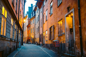 Stockholm's Gamla Stan old town district at night, Sweden - obrazy, fototapety, plakaty