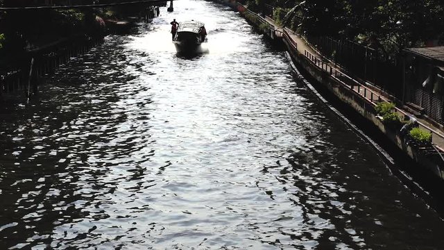 Saen Saep canal passenger boat, in Bangkok, the capital city of Thailand, atmosphere at noon.