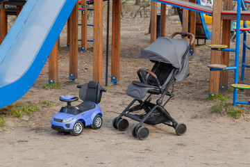 Beautiful baby carriage in the park. New design.