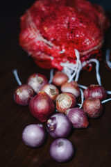 Fresh onion in Malaysia during preparation of Eid Mubarak (Hari Raya) on a wooden textured background
