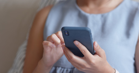 Woman use of smart phone at home