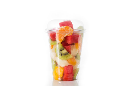 Fresh Cut Fruit In A Plastic Cup Isolated On White Background