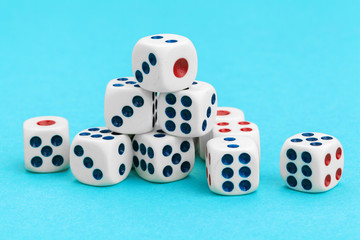 Gaming dices on blue background. Game concept.