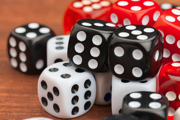 Dice on a wooden table. Concept for business risk.