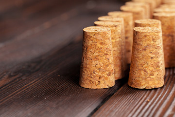 Close up of a cork wine with different variation of wine color