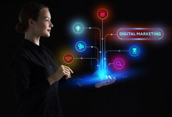 The concept of business, technology, the Internet and the network. A young entrepreneur working on a virtual screen of the future and sees the inscription: Digital Marketing