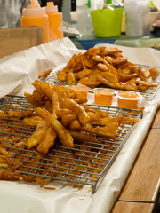 Potato chips that are placed on a steel basket,For sale in Thai Street Food Market