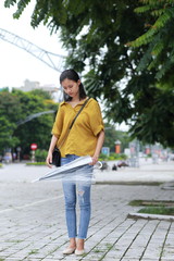 woman with umbrella in town