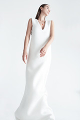 Obraz premium Young female with stylish necklace with orange gemstone