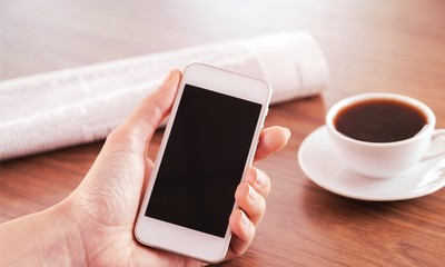 Young woman hand using phone