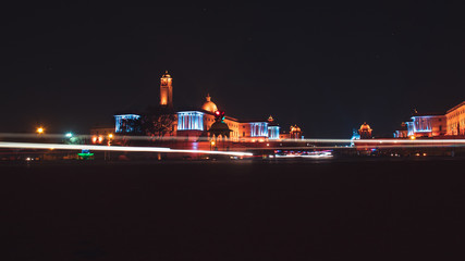 The Rashtrapati Bhavan during night time with light trails.