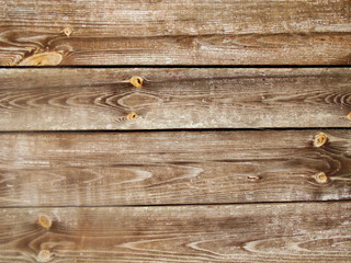 Beautiful interesting texture of untreated wood. Old painted boards closeup.
