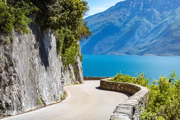 Selbstklebende Fototapeten Gardesana Road near Limone sul Garda. Garda Lake, Lombardy, Italy © stefanotermanini