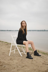 Stylish girl posing in stylish clothes