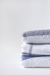 Kitchen towels folded with copy space, vertical