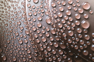 Drops of water on the plastic cover of drink of coffee