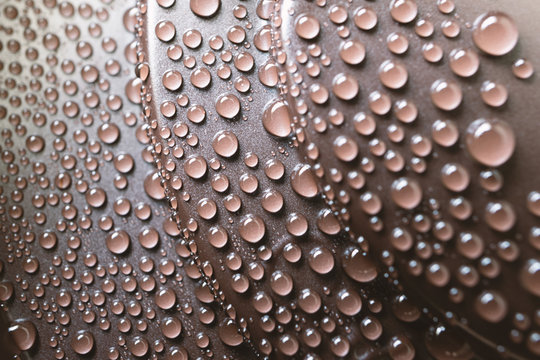 Drops of water on the plastic cover of drink of coffee