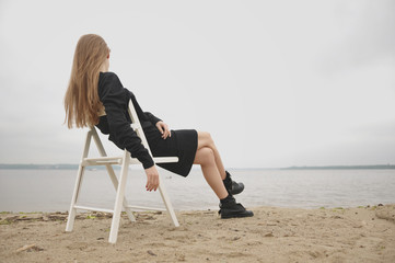 Stylish girl posing in stylish clothes