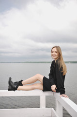 Stylish girl posing in stylish clothes