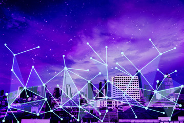 Network connection overlay on futuristic theme cityscape background.