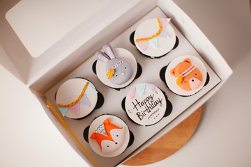 Cupcakes with mastic decor. Dessert