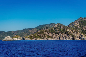 Fototapeta na wymiar blue sky, high mountains and blue sea of Marmaris