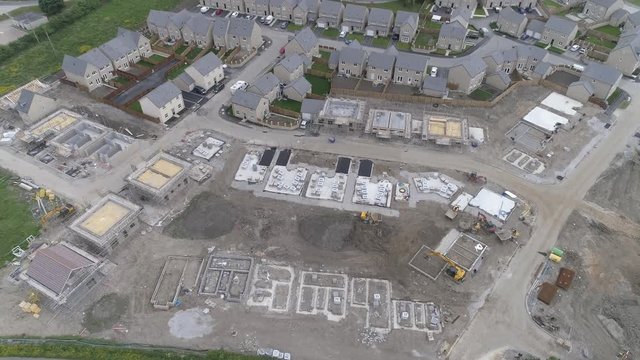 Aerial drone of housing estate being built, construction site, yorkshire
