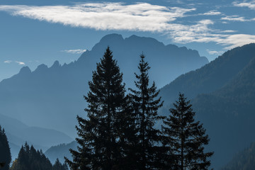 Beautiful alpine countryside. Scenic image of famous Sassolungo peak with overcast perfect blue sky. Wonderful Vall Gardena under sunlight. Majestic Dolomites Mountains. Amazing nature Landscape