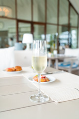 sparkling wine glass on table in cafe restaurant