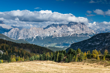 Obraz premium Beautiful alpine countryside. Scenic image of famous Sassolungo peak with overcast perfect blue sky. Wonderful Vall Gardena under sunlight. Majestic Dolomites Mountains. Amazing nature Landscape