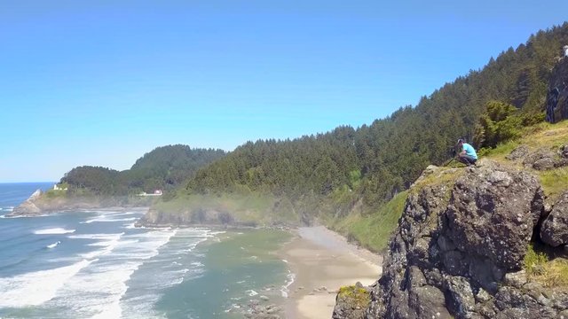298 Pacific Northwest aerial photographer working on a cliff
