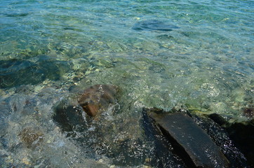Crystal blue Black Sea and stones in Bulgaria, Nessebar island