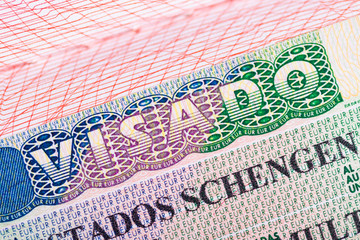 Obraz premium Stamp in the passport for travel and entry into Spain