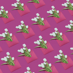 Decorative background with gift envelopes of tulips flowers on a magenta.