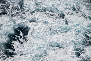 Fototapeta na wymiar blue green water in stormy sea