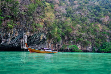Obraz na płótnie Canvas Vacation on island. Beautiful landscape with sea, boat and rocks.