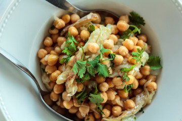 Top view of Grain salad with cod and coriander