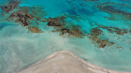 Fototapeta na wymiar Aerial drone panoramic view photo of famous exotic paradise sandy deep turquoise beach of Elafonissi in South West Crete island, Greece