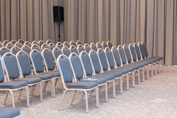 Empty blue chairs in conference hall - presentation room