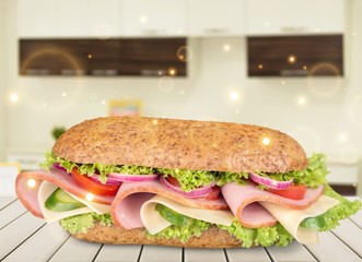 Footlong ham & swiss submarine sandwich isolated on white