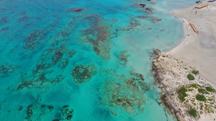 Aerial drone panoramic view photo of famous exotic paradise sandy deep turquoise beach of Elafonissi in South West Crete island, Greece