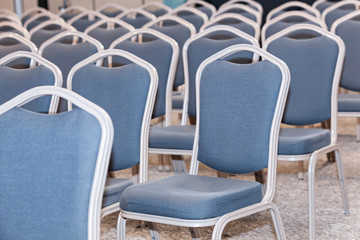 Empty blue chairs in conference hall - presentation room