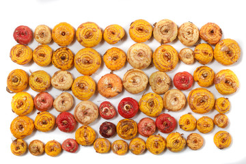 Fototapeta premium pile of natural onions with some small defects