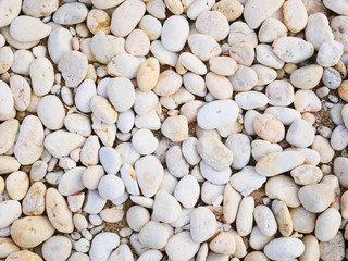 white pebbles stone background , smooth stone texture