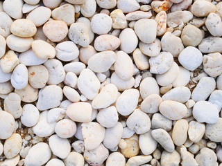 white pebbles stone background , smooth stone texture
