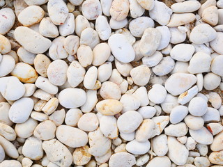 white pebbles stone background , smooth stone texture