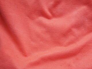 Fototapeta na wymiar red silk cloth background , colorful cotton fabric texture