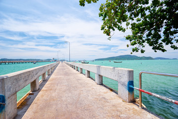 Beautiful landscape with pier on the sea shore.